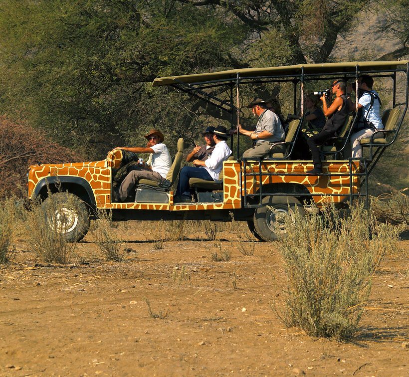 Do I need to make a reservation for a game drive in Maasai Mara?