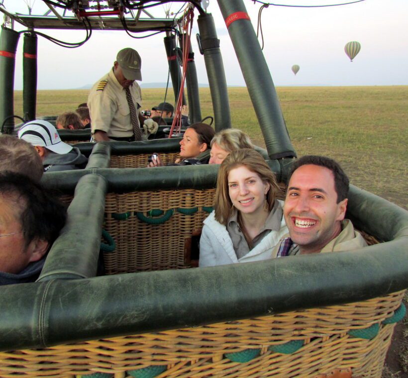 How early in the morning do the hot air balloon safaris start in Maasai Mara?